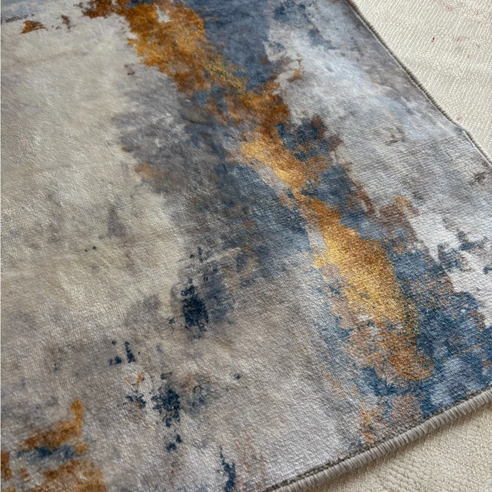NWOT Abstract Blue and Gold Area Rug